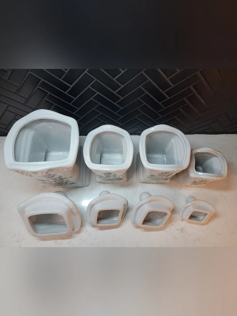 Set Of 4 Delfts Hand Made White Floral Ceramic Canisters